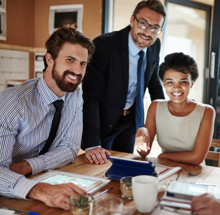 Business, team and portrait with meeting in office for budget planning, corporate funding review and strategy. Finance manager, employees and happy people with digital technology for project capitalの写真素材