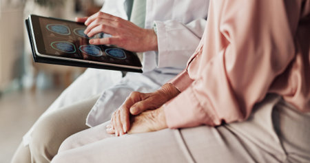 Hands, patient and doctor with tablet, screen and healthcare with neurosurgeon. Dementia, medical or...