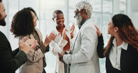 Business people, applause and support in office for award, achievement or employee development. Team, clapping and celebration in workplace for congratulations, success or prize winner with diversityの写真素材