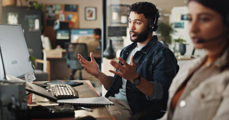Businessman, agent or tech support with headphones at call center for web navigation or technical...