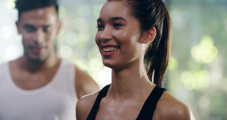 Happy woman, personal trainer and fitness with workout for exercise, training or sweat at gym....