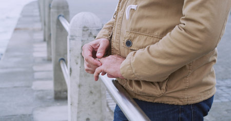 Hands, wedding ring and thinking with man, closeup and doubt with commitment. Fingers, person and...