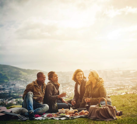 Friends, picnic and people on mountain talking with view on holiday, vacation and adventure...