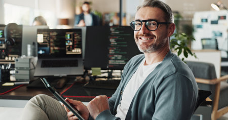 Programmer, happy businessman and portrait with tablet for software development, ai database and code online. Engineer, face and mature manager on digital technology with glasses in creative startupの写真素材