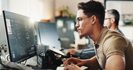 Computer, programming and web development with man in creative workplace for coding or design....