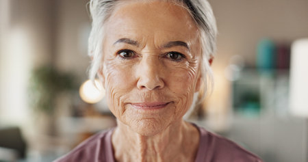 Senior woman, portrait and smile with anti aging treatment, collagen facial results and microblading confidence. Beauty, face and cosmetics for wrinkles, skin hydration or dermatology with aestheticの写真素材