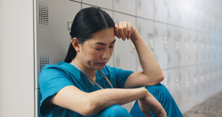 Tired, woman and surgeon with headache in hospital of healthcare stress, medical mistake and burnout...
