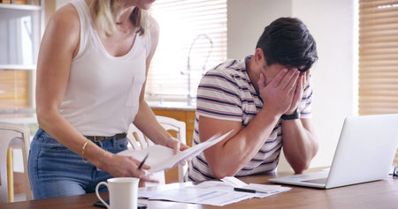 Finance, stress and couple with laptop with bills, crying and internet banking issue in debt. Home,...