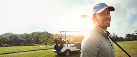 Golf, portrait and man on course with cart, equipment and driver with confidence and smile from sport, Fitness, grass and banner with athlete, professional and game outdoor with mockup and golferの写真素材