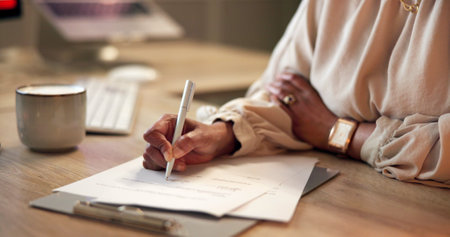 Hands, night and business with woman, writing and reading contract for company policy. Legal document, employee or consultant with signature, clipboard or negotiation detail with compliance and dealの写真素材