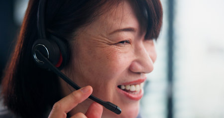 Happy, asian woman or face with headset at call center for online consulting, support or virtual...