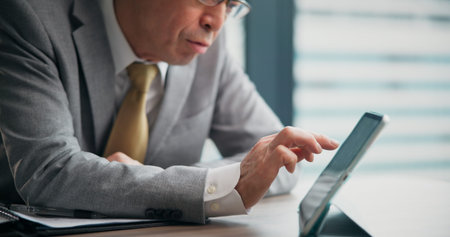 Tablet, search and hands of man in office with documents, business plan or online schedule at desk....