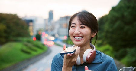 Smile, woman and speaker with phone in city for conversation, audio recording and travel gossip....