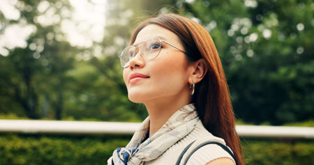 Outdoor, travel and walking with woman, thinking and tourism with journey, holiday and wonder....
