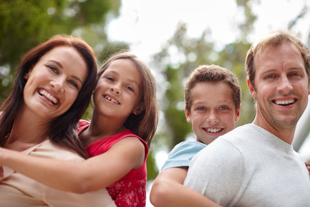 Family, portrait and piggyback in backyard together for love, bonding and security for connection....