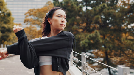 Woman, running and warm up for fitness in city, stretching arms and outdoor nature for thinking....