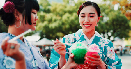 Kimono, slushy and toast with Japanese women outdoor in city together for bonding as friends....