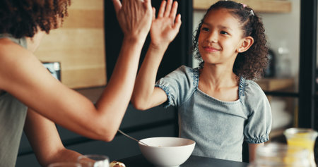 House, high five and mother with girl, breakfast and morning with happiness, love and support....