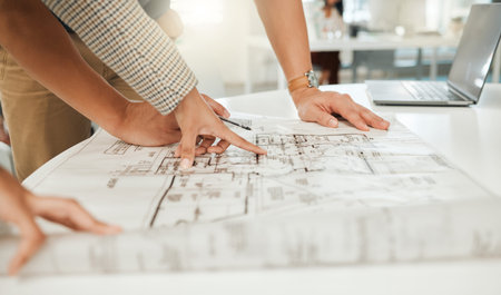 Employees, hands and blueprint for architecture project in office, collaboration and teamwork....
