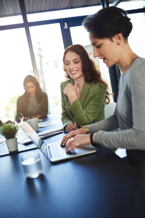 Office, mentor and business people with laptop for typing, discussion and access to company page. Tech, web designer and manager in creative agency for helping, startup progress and online solutionの写真素材