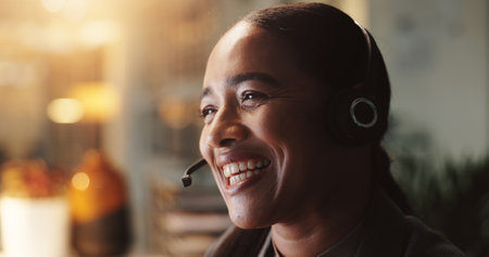Call center, smile and support with woman in customer service office for virtual assistance. Contact us, consulting and help with happy assistance person in communication workplace for night shiftの写真素材