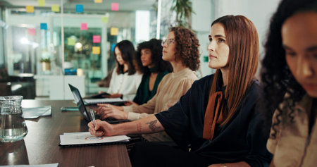 Meeting, workshop and conference with business people in office for seminar, teamwork and acquisition opportunity. Planning, asset valuation and training with group of women in boardroom for clientの写真素材