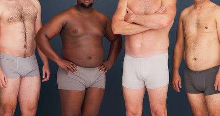 Studio, body positivity and group of men in underwear with confidence, inclusion and unique...