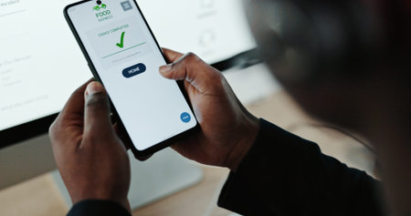 Hands, phone screen and order for food delivery at office with check sign, payment or deal at call...