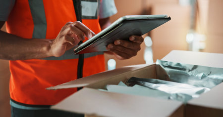 Hands, tablet and package for shipping at warehouse with scroll, inventory and check with supply chain job. Person, freight and touchscreen for checklist, app and box with logistics for distributionの写真素材