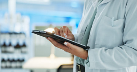 Scientist, hands and tablet for research, notes and experiment results or medical information....