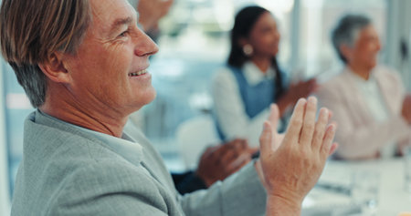 Smile, business man and applause at meeting to celebrate success, support and cheers in office. Training conference, audience and clapping hands at workshop, seminar or mature manager at presentationの写真素材