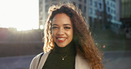 Smile, commute and portrait of business woman in city for morning journey, professional and opportunity. Happiness, confidence and pride with female employee in Brazil outdoors for career and urbanの写真素材