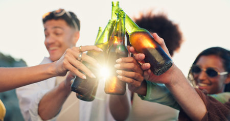 Beach, cheers and group of happy people with beer, sunset and bonding on tropical holiday together....