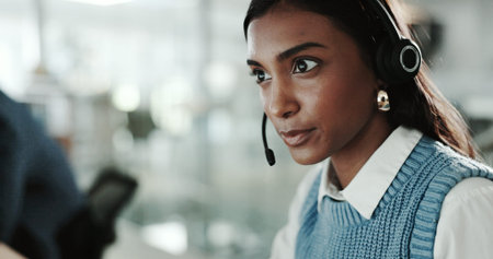 Call center, consulting and face of Indian woman with headset in support office for customer...