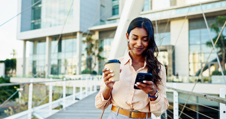 Happy woman, phone and coffee with bridge in city for social media, communication or reading news....