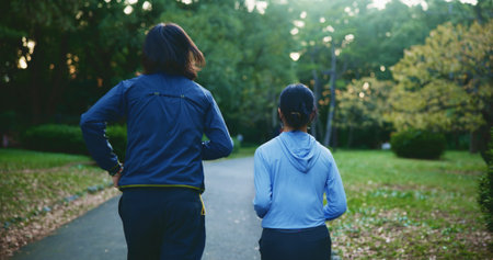 Park, couple of friends and running for fitness for self care, wellness and health in Japan. People,...