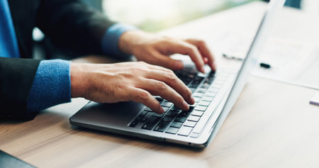 Man, hands and typing on laptop for business, planning and update schedule in Japan office. Corporate person, computer and connectivity in workplace for email, contact or economy research for growthの写真素材