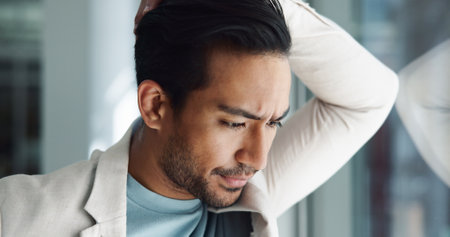 Office, thinking or Asian man with fear, worry and stress crisis for problem solving dilemma. Doubt, nervous or face of scared business advisor with bankruptcy risk, corporate failure and mistakeの写真素材