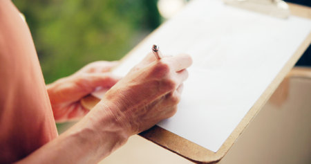 Courier, signature and clipboard with hands and delivery for shipping, ecommerce and supply chain. Online shopping order, logistics and distribution with closeup of person for package and cargoの写真素材