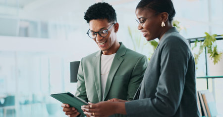 Coaching, eco consultant and tablet with business people in office for sustainability manager, research and planning. Environment policy, climate change solution and discussion with employeesの写真素材