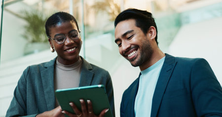 Smile, eco consultant and tablet with business people in office for sustainability manager, research and planning. Environment policy, climate change solution and teamwork with employees and projectの写真素材