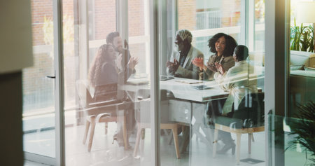 Business people, applause and happy in office for achievement, company growth and support for promotion. Corporate team, clapping and excited in boardroom for new employee, investment success or newsの写真素材