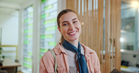 Business woman, happy and portrait in office for professional service, confident and career. Employee, smile and internship in workplace for job ambition, growth and company development in Franceの写真素材