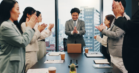 Celebration, boss and people in meeting, clapping and happy for achievement, boardroom and smile. Success, teamwork and applause for accomplishment, investor and joy for business and excited in Japanの写真素材