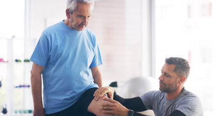 Physiotherapist, elderly patient or knee pain with injury for checkup, exam or pain relief at...