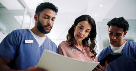 Hospital chief, documents and planning with doctors and woman for consultant, schedule and feedback....