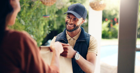Delivery man, customer and happy with package by home for online shopping order, fast food distribution or service. Logistics, woman and male driver in export industry for supply chain or safe parcelの写真素材