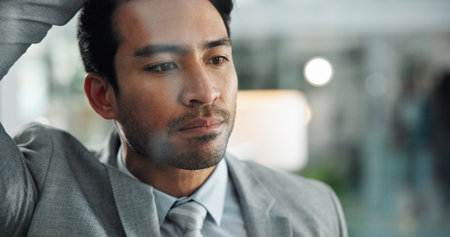 Man, lawyer and thinking with stress at office for mistake, fail and regret for lost court case at job. Person, advocate or attorney for reflection, idea and problem solving for justice at law firmの写真素材