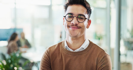 Portrait, lawyer and career man with smile as professional, advisor and law firm in office. Male person, happiness and confidence as staff, legal representative and consultant in company or corporateの写真素材