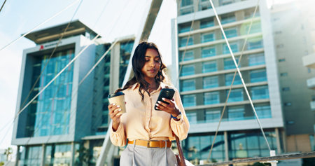 Phone, coffee and walking with business woman in city for communication, corporate email and travel....